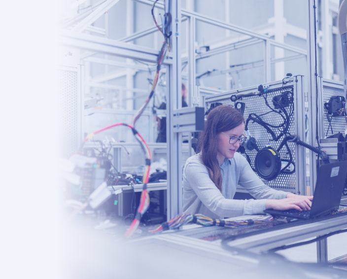 An IT professional at work in a lab